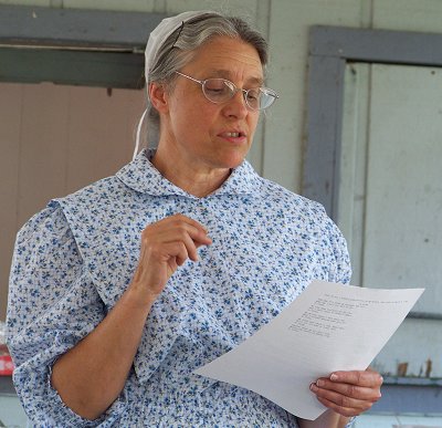 Celestia Nelson reading some old poetry at the 2009 Evers Reunion